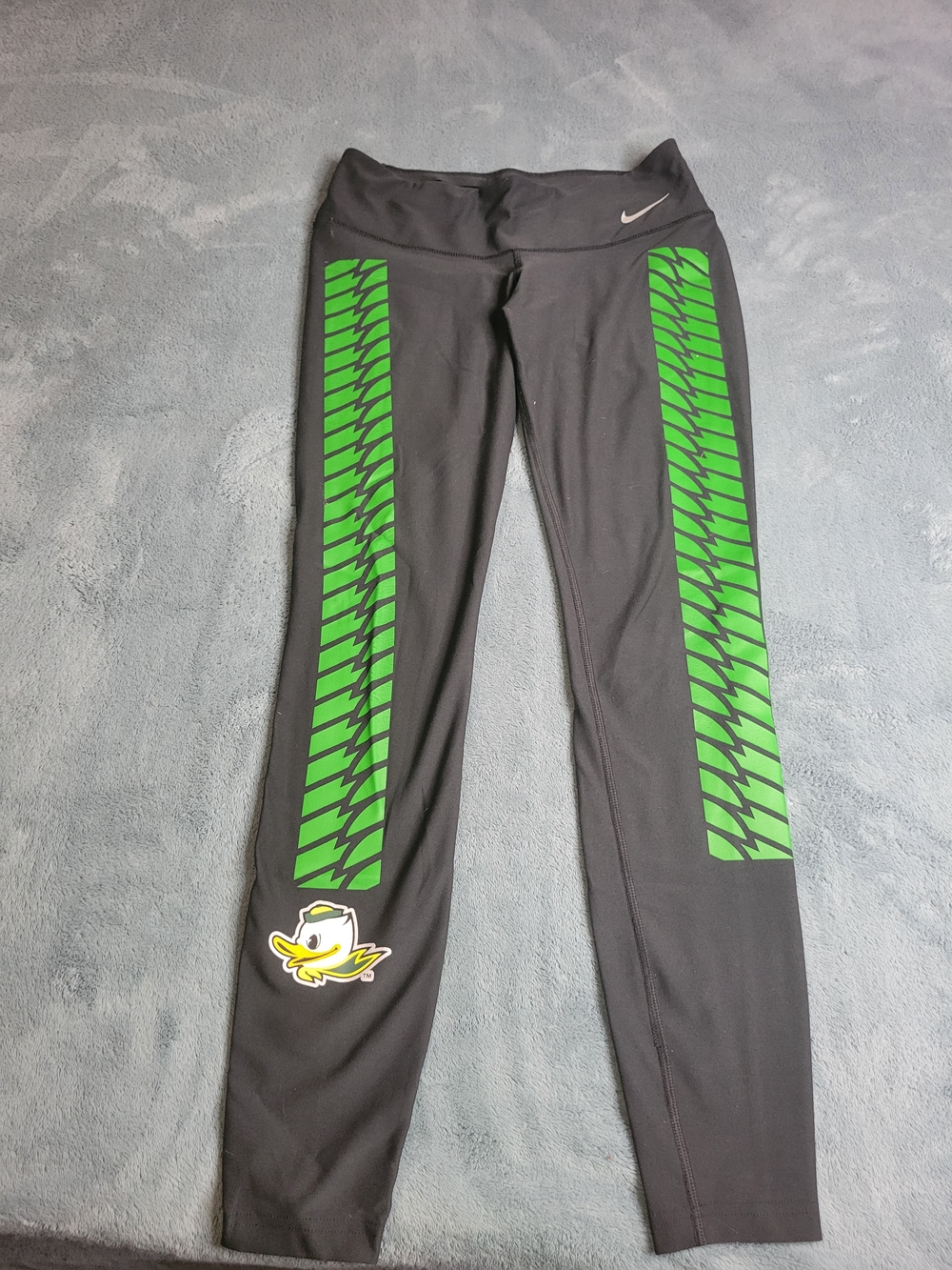 Nike Black Leggings with Green Chevron Stripes and Duck Logo
